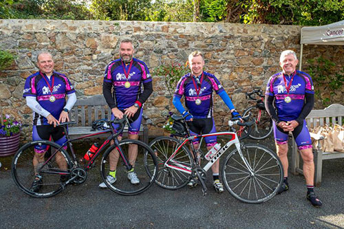 Cyclists saddle up in aid of Purple House charity